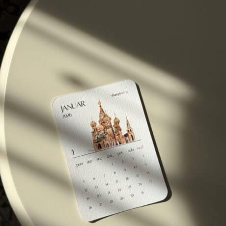 Colorful January 2026 calendar with Saint Basil's Cathedral illustration in warm tones.