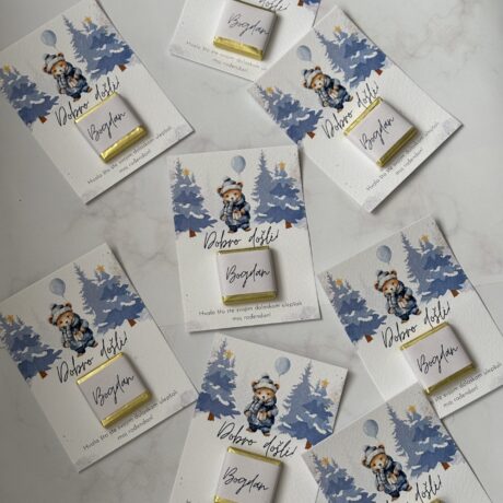 Festive greeting cards with teddy bear design and personalized name tags for Christmas.