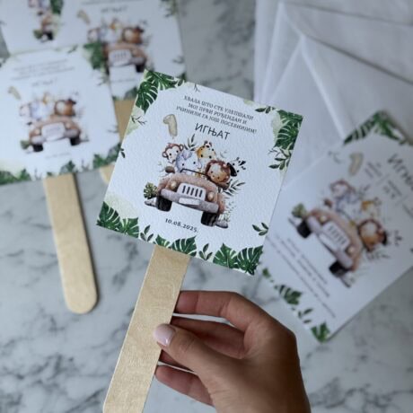Cute jungle-themed first birthday party favor with animal illustrations and wooden sticks.