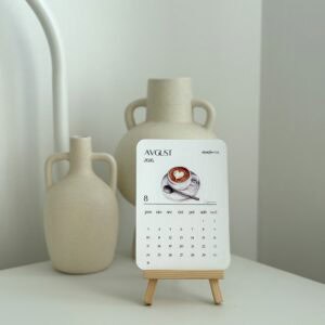 Elegant minimalistic desk calendar with coffee-themed design, perfect for modern home office decor.