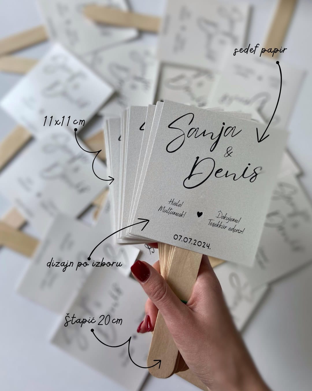 1. Custom wedding favor paper fans with names and date, ideal for wedding decorations and events.